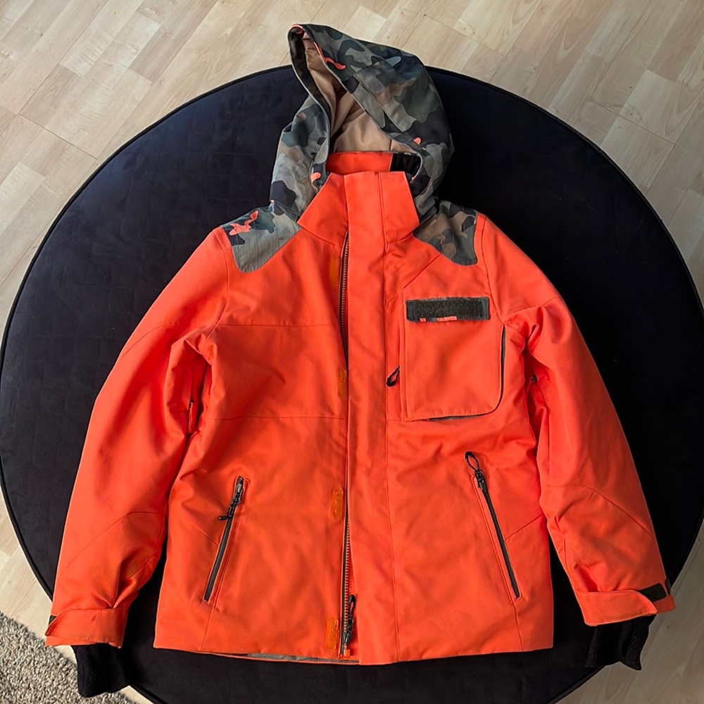 Obermeyer Teen Snowboard / Ski Jacket. Size Teen Medium (10-12). Color: Orange